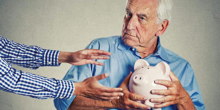 A man holding his savings. Source: standrews